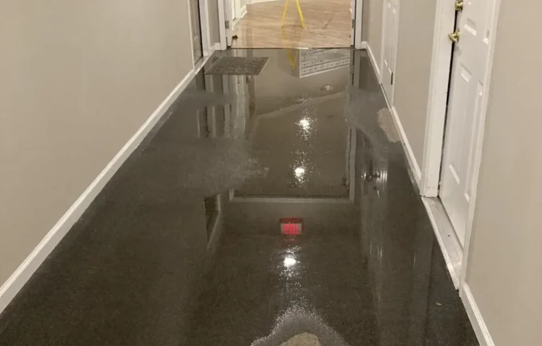 Standing water in an interior corridor