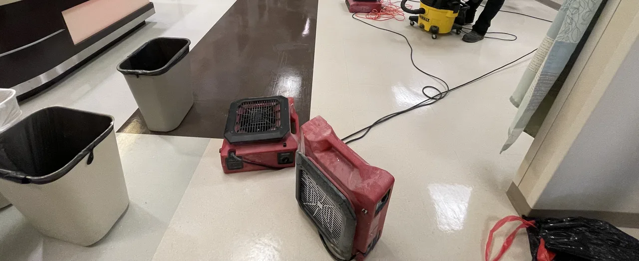 Floor-cleanup and air-moving equipment operating in an anonymous North Texas healthcare facility